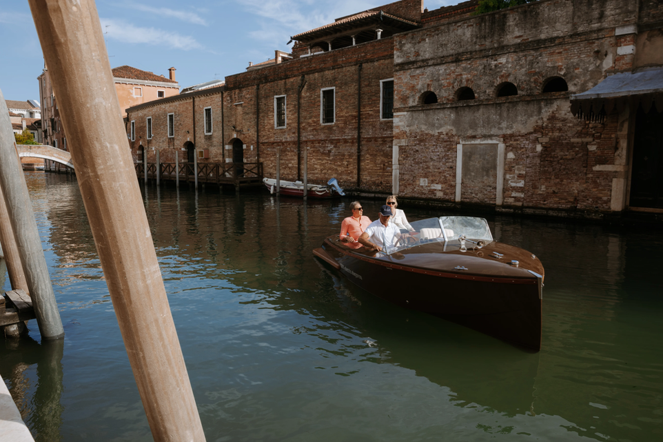 Couple in the boats in Venice