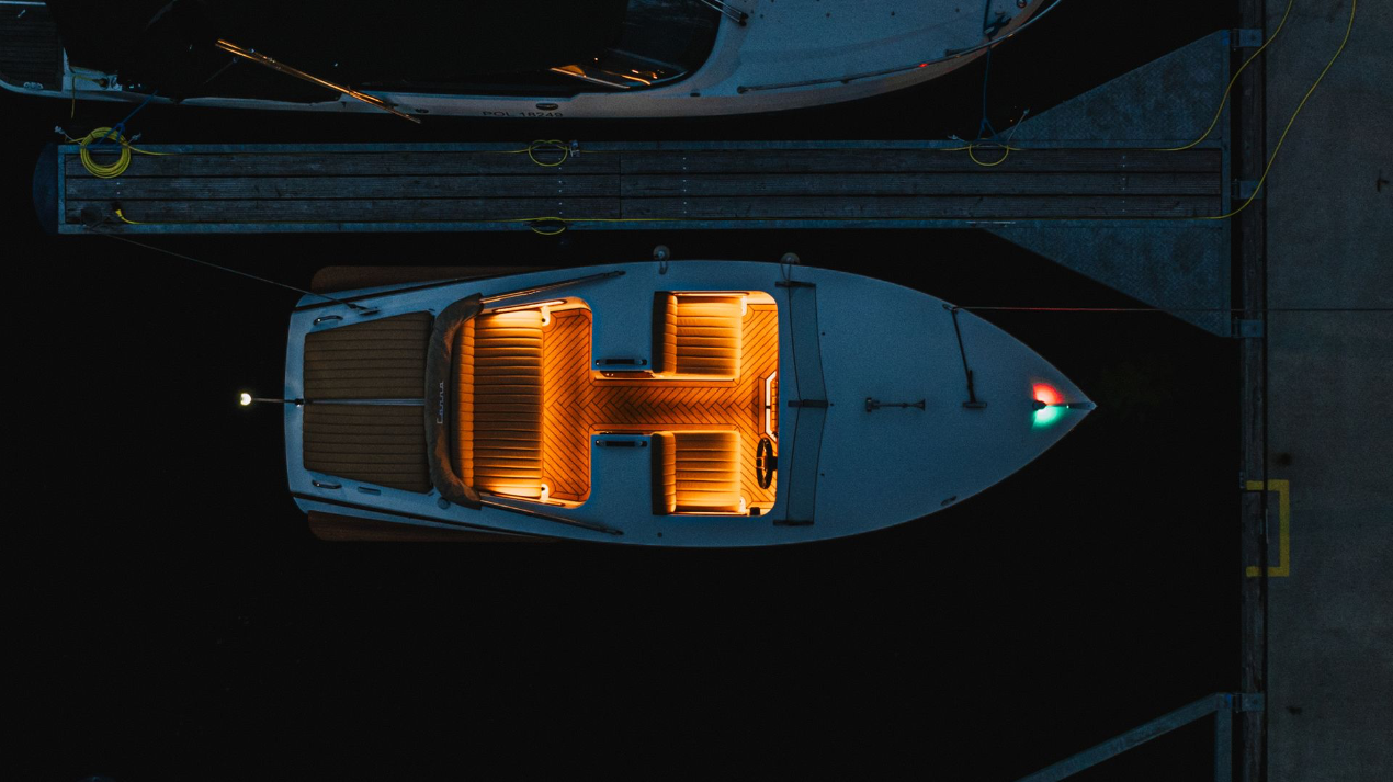 white boat with led lights